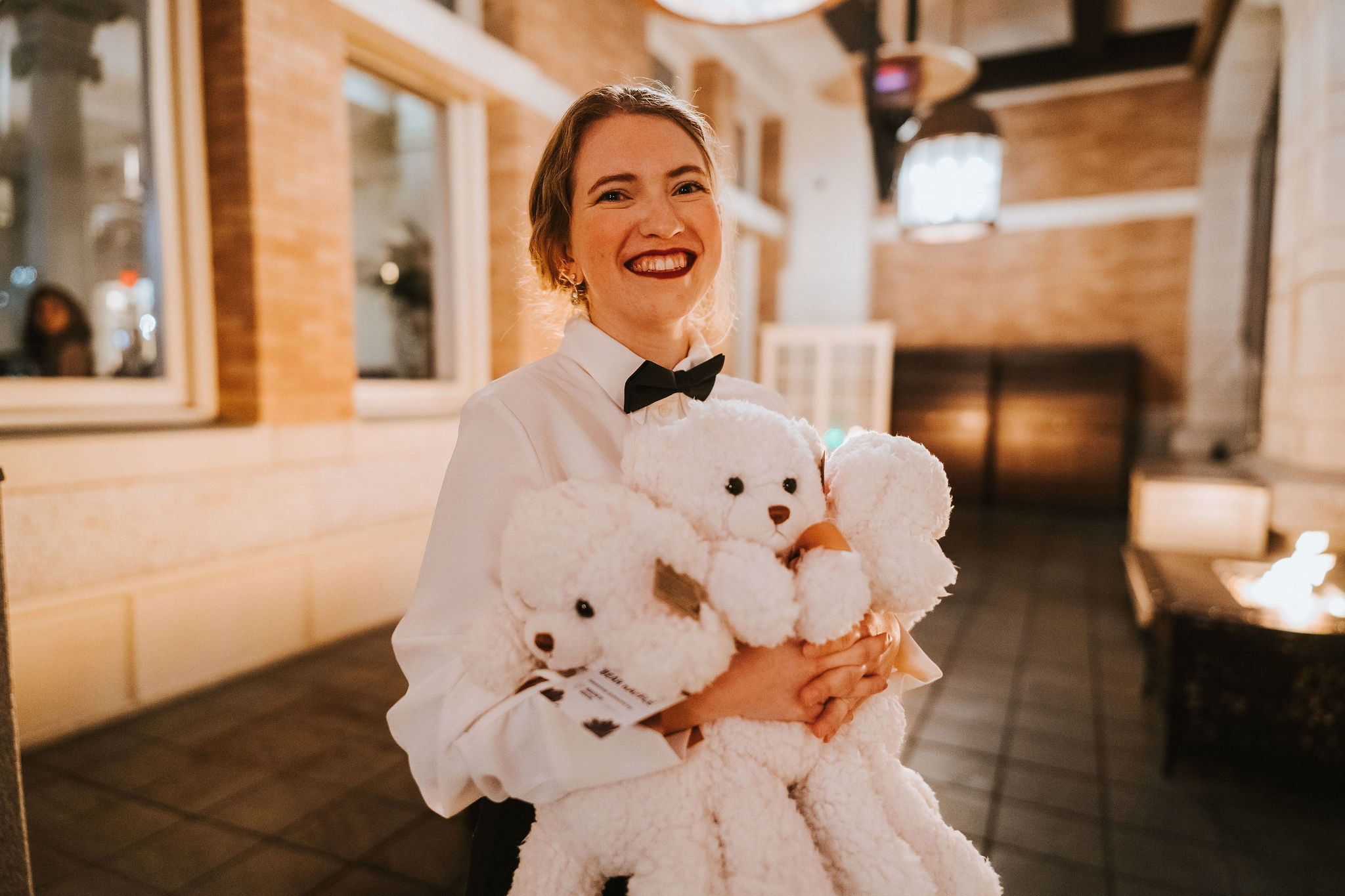 A Victoria Hospitals Foundation (VHF) volunteer carrying teddy bears for the Visions Gala at the Fairmont Empress Hotel