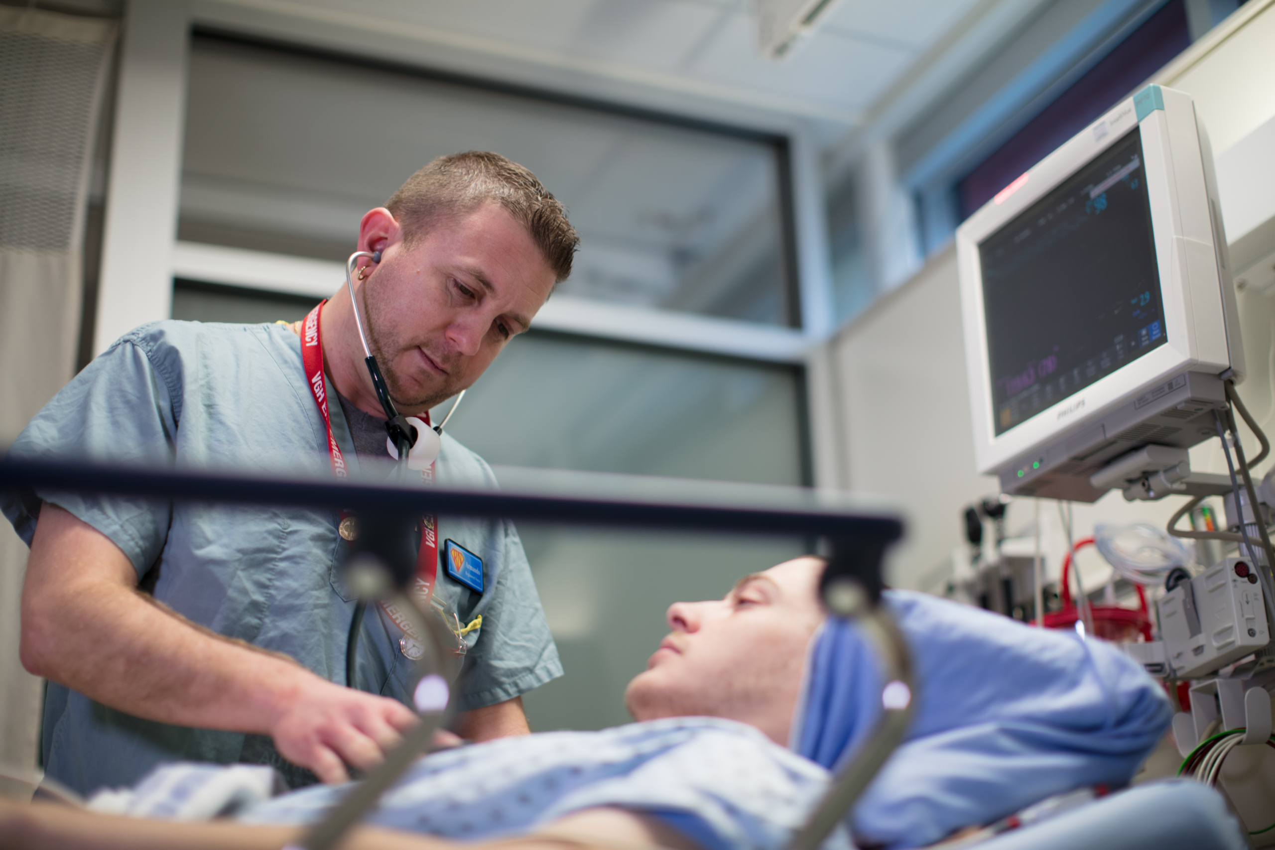 Emergency caregiver assesses a patient at Victoria General Hospital (VGH)