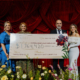 Avery Brohman, CEO, Victoria Hospitals Foundation, gynecologic oncologist Dr. Mona Mazgani, gynecologic oncologist Dr. Trevor Cohen, and Amy Ratcliff, Miracle Gala Chair holding a cheque from the miracle Gala at Royal Roads University for $1,764,420