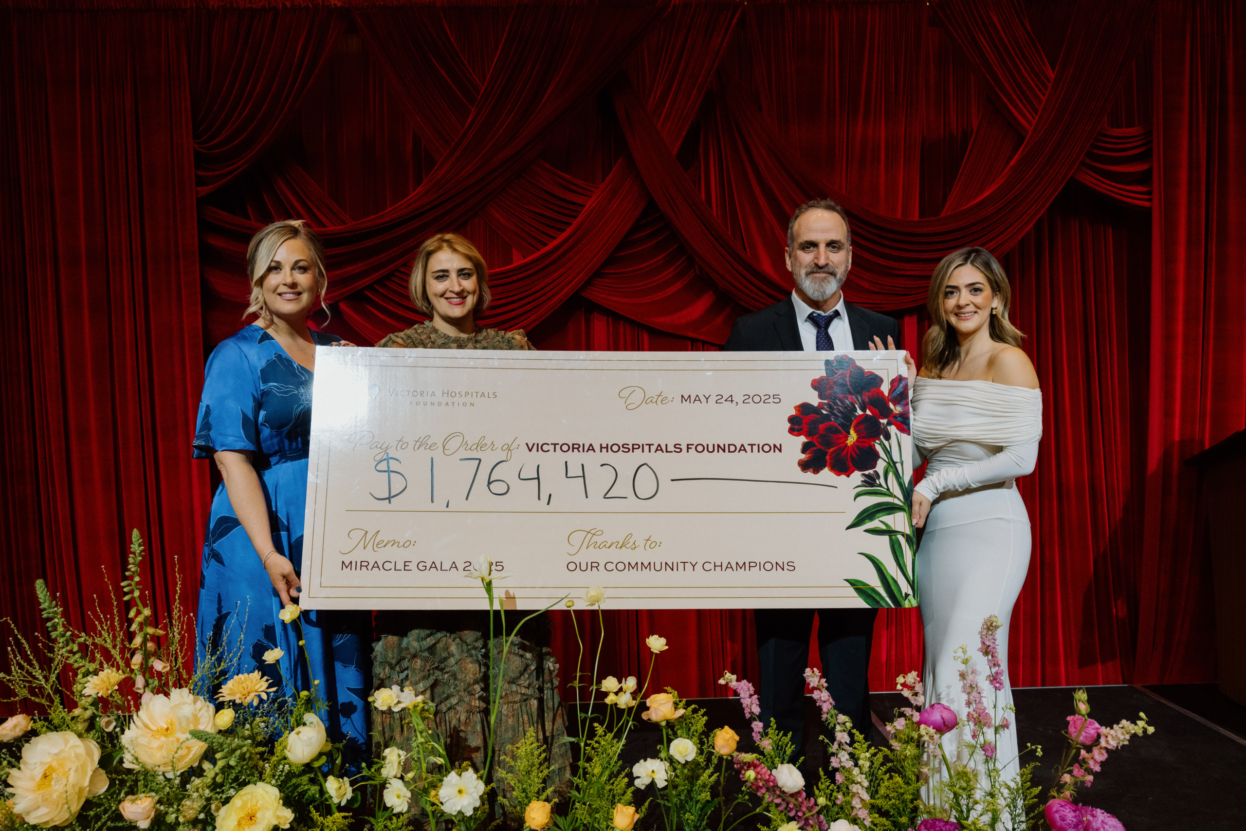 Avery Brohman, CEO, Victoria Hospitals Foundation, gynecologic oncologist Dr. Mona Mazgani, gynecologic oncologist Dr. Trevor Cohen, and Amy Ratcliff, Miracle Gala Chair holding a cheque from the miracle Gala at Royal Roads University for $1,764,420