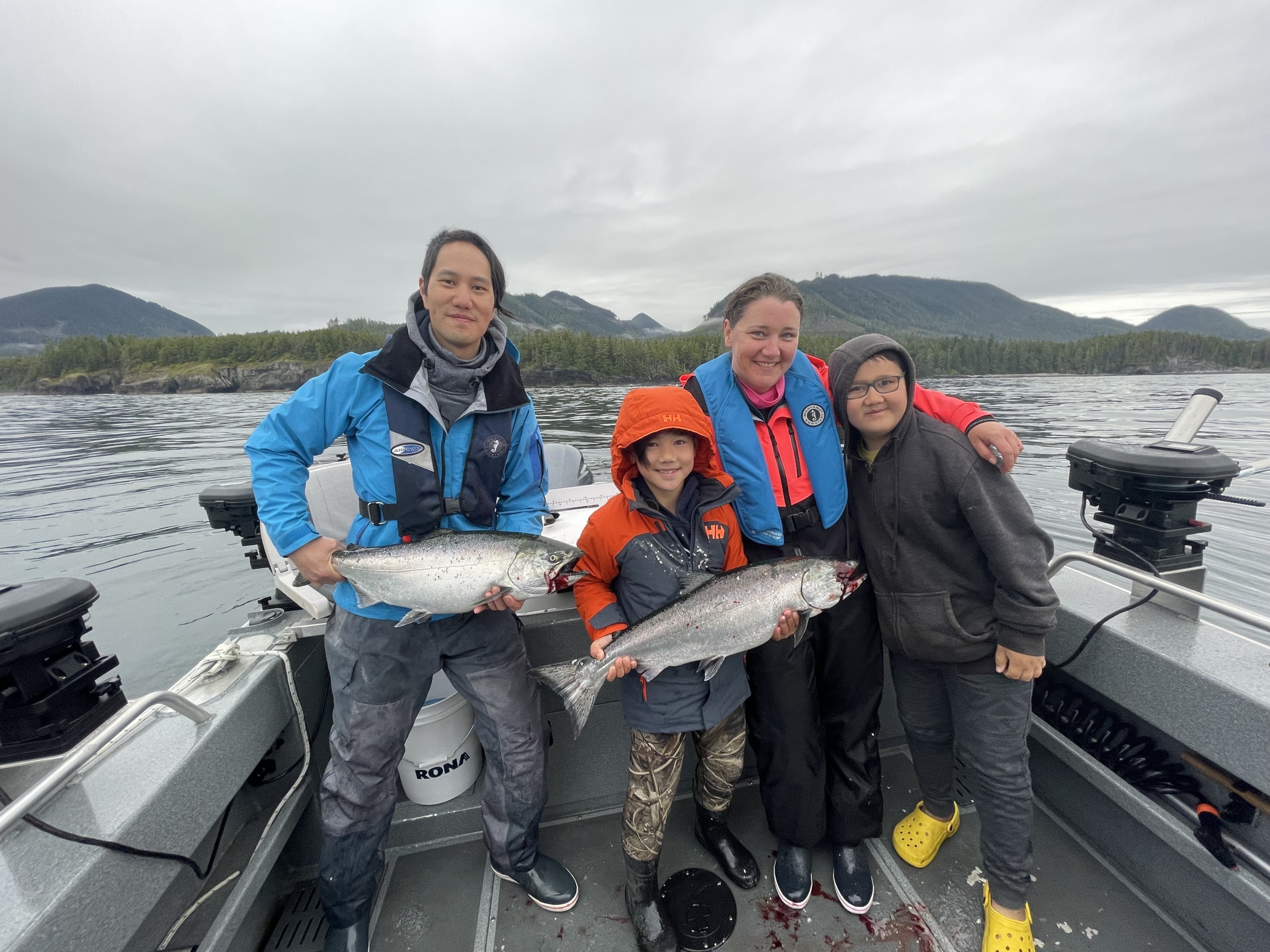 Nurse Brian Lee with his family on a fishing trip in the gulf islands