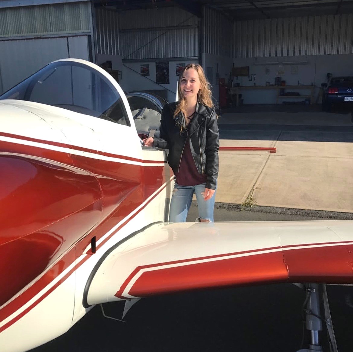 Operating Room nurse Madison Carr with her custom airplane