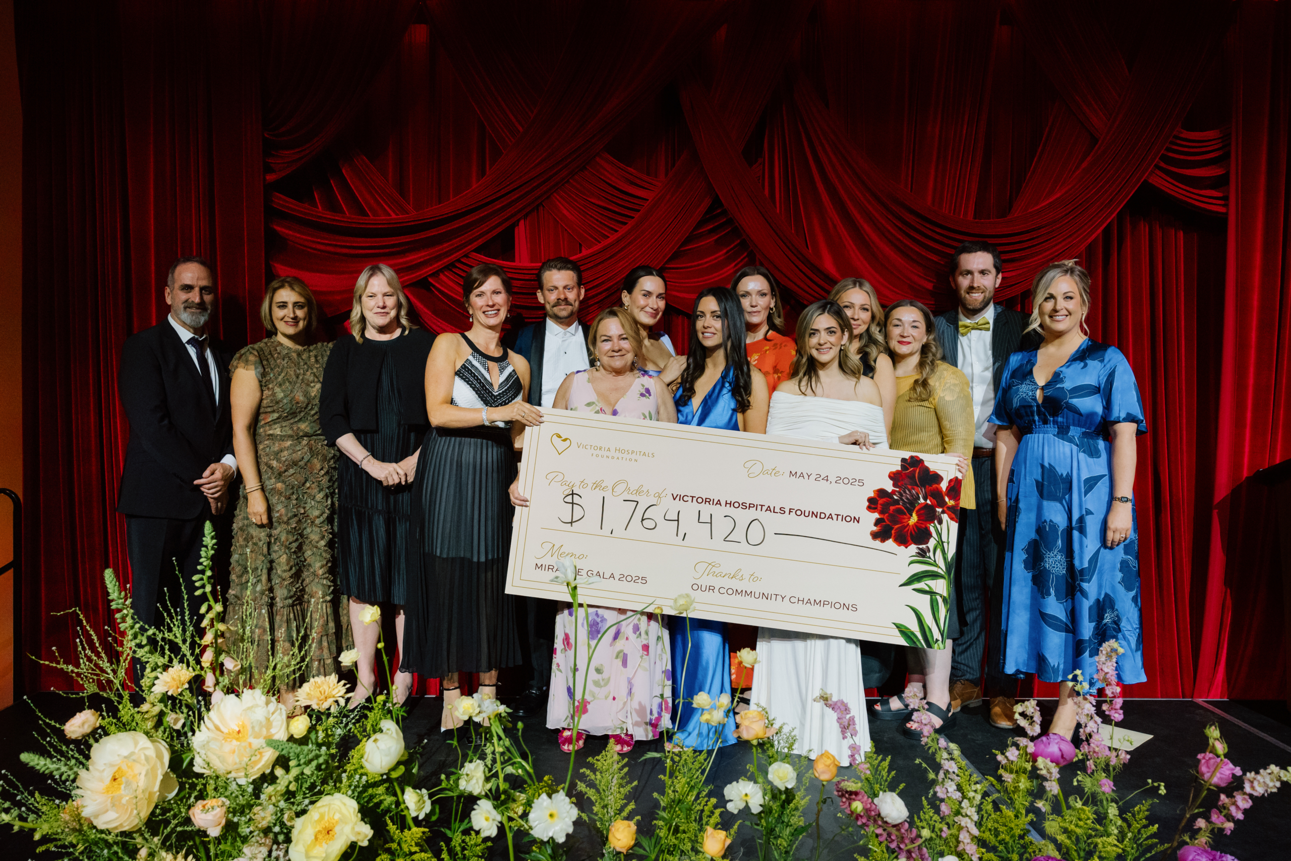 Miracle Gala Commitee members, Amy Ratcliff (Committee Chair) , Tara Carere, Vicki Clark, Jeff Crone, Brandy Gordon, Jack Groucott, Darlene Hollstein, Charlene Lindsay, Amanda Young, & Ola Zailo, with foundation leaders and physicians presenting the grand total cheque for $1.76 million dollars