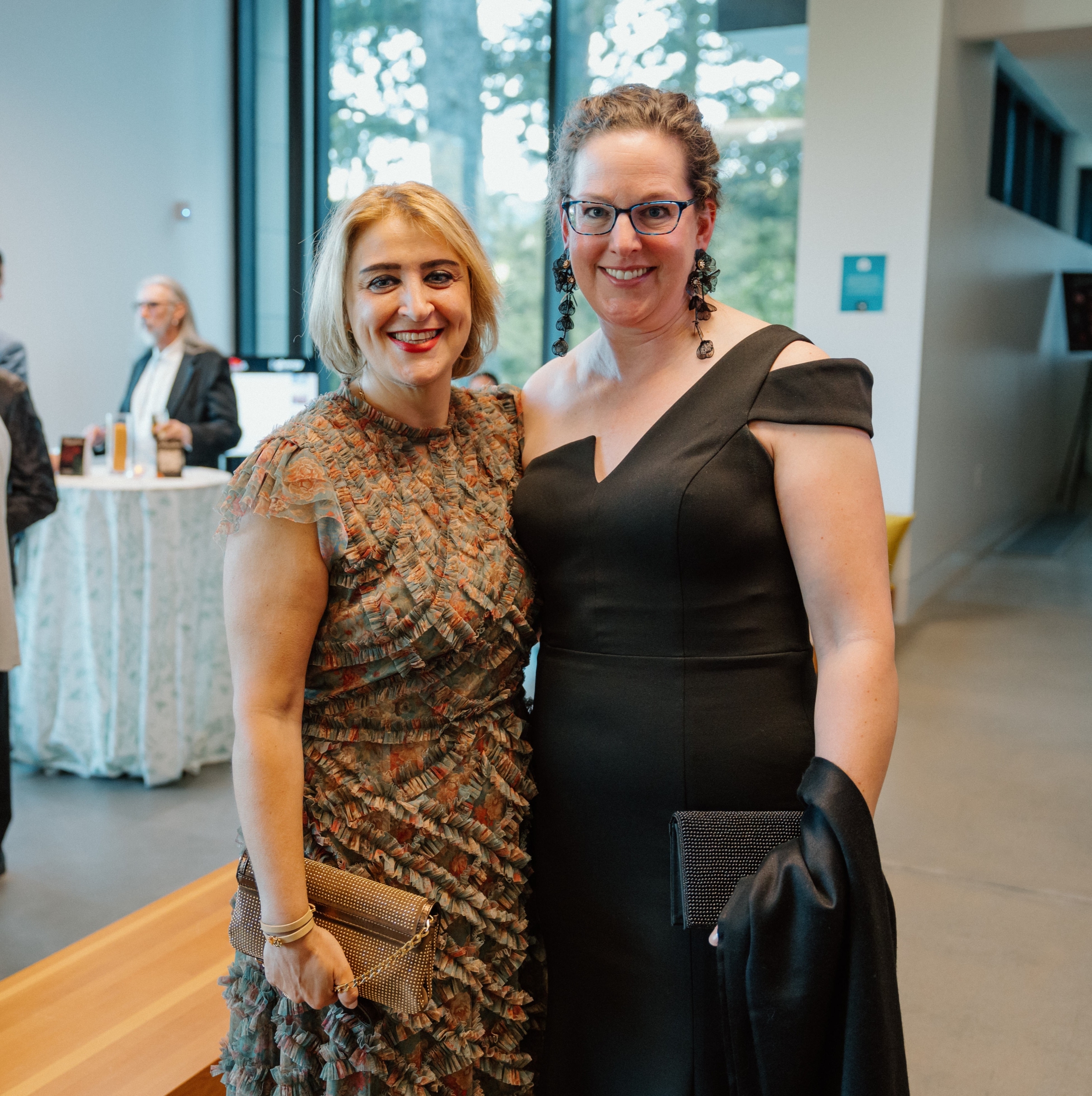 Kirsten De Launiere with Dr. Mona Mazgani at the Miracle Gala, hosted at Royal Roads University