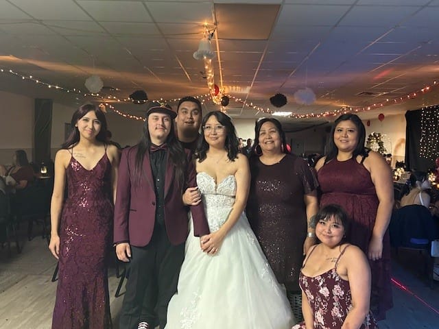 Ruby Ambrose with her children at a family wedding