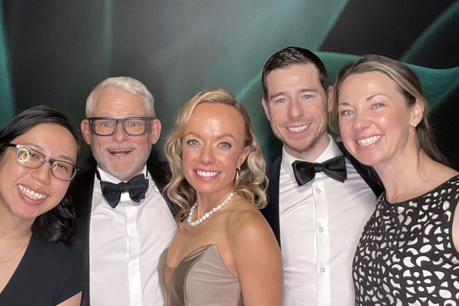 1 Visions Guests including Urologist Dr. Greg Hosier posing at a photobooth