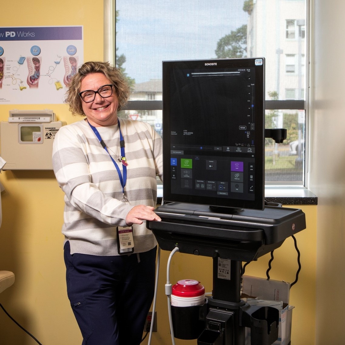 Nurse with an ultrasound machine in the Royal Jubilee Hospital Renal unit