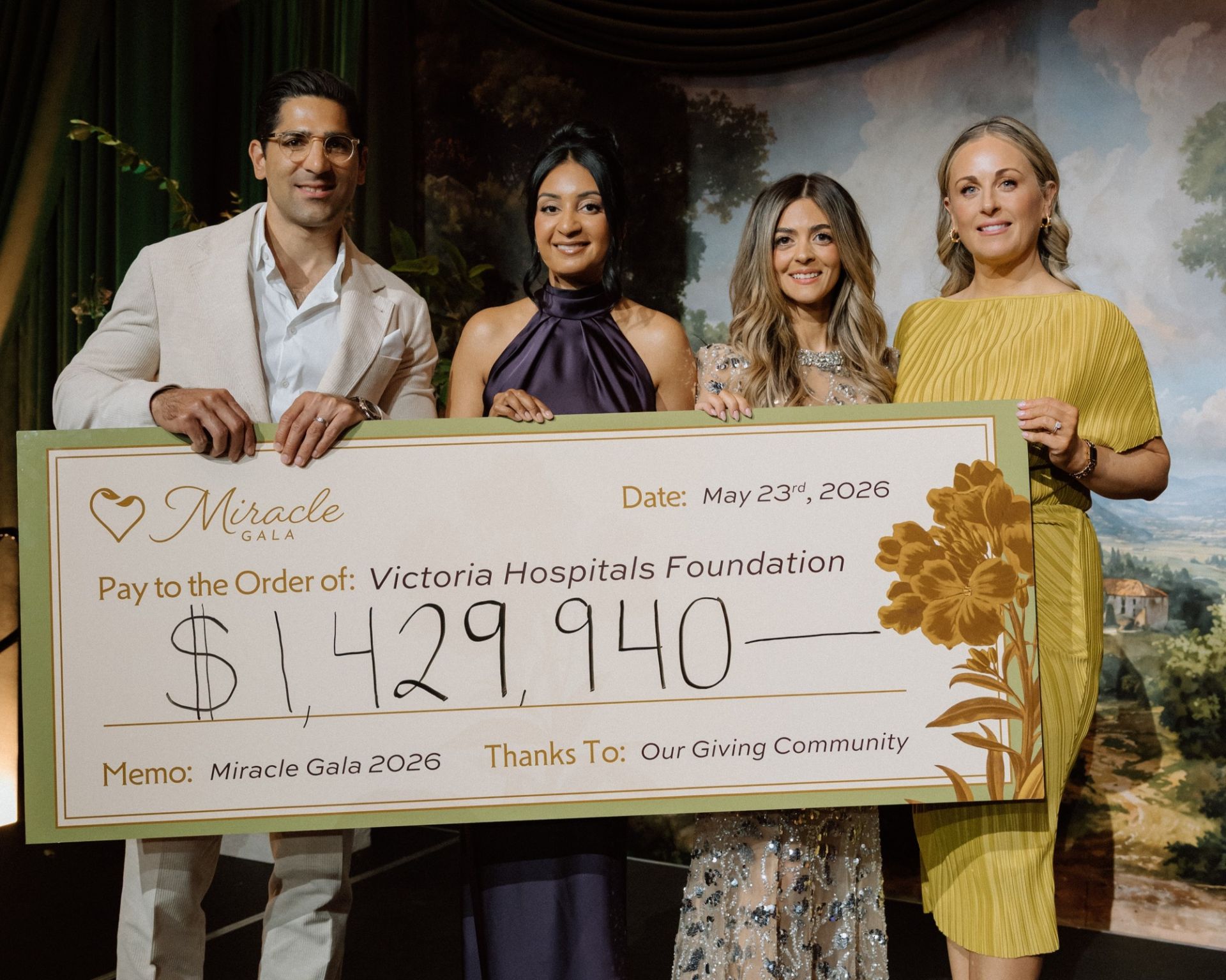 Physician Speaker Dr. Sepehr Khorasani (left), Patient Speaker Shaveeta Jnagal, Gala Chair Amy Ratcliff, and Foundation CEO Avery Brohman hold the cheque for the evening's total_ $1,429,940web Physician Speaker Dr. Sepehr Khorasani (left), Patient Speaker Shaveeta Jnagal, Gala Chair Amy Ratcliff, and Foundation CEO Avery Brohman hold the cheque for the evening's total_ $1,429,940, at Royal Roads University