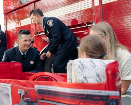 Saanich Firefighter Drew Coleman with a pediatric patient at Victoria General Hospital (VGH)