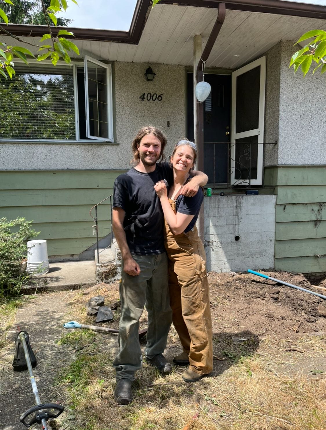 IMG_3611 Ashlynn Bossi and her Zeb renovating outside of their home.