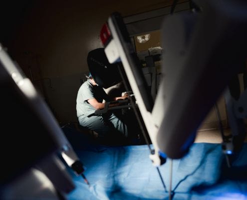 Dr. Jeff McCracken, Victoria BC Urologist, with a daVinci Robotic system.
