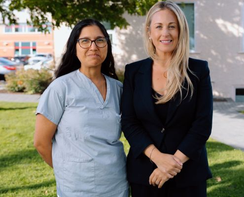 Head of Surgery Dr. Nadra Ginting and Victoria Hospitals Foundation CEO Avery Brohman outside of Royal Jubilee Hospital (RJH)