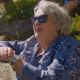 Bette French, Planned Giving Donor to the Victoria Hospitals Foundation admires the view on the Songhees Walk in Esquimalt BC